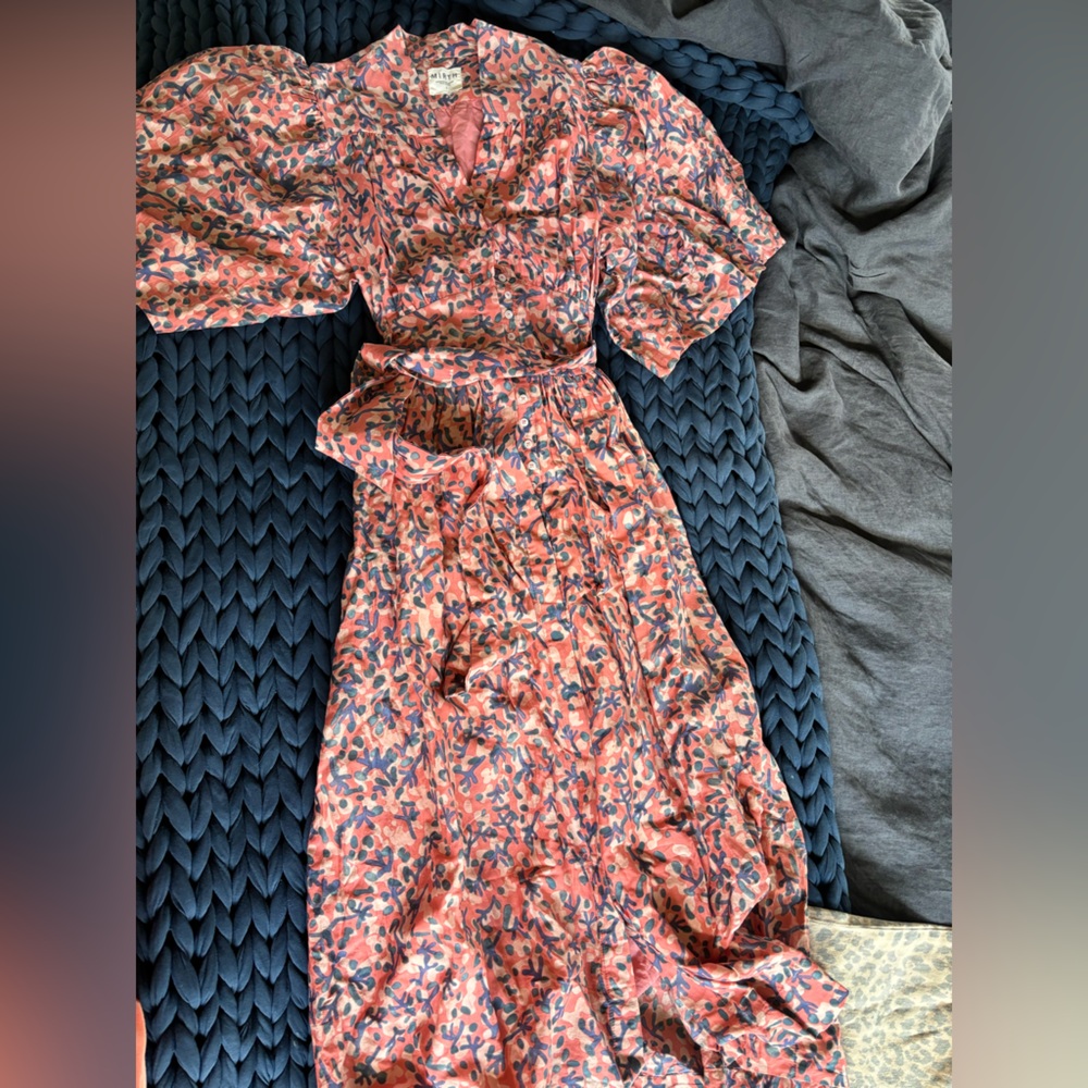 Mirth caftans midi dress with bell sleeve and button front.